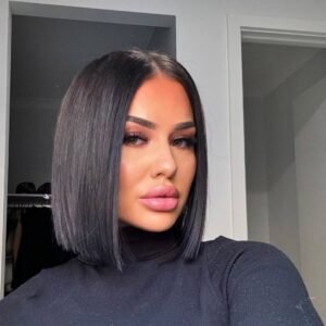 straight black blunt bob haircut ending at the chin with a middle part