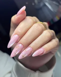 pink cat eye stiletto nails with gold star and sparkle nail art designs