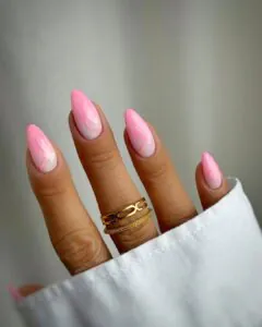 long pointed ombre pink nails with delicate abstract swirl nail art designs.