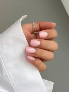 short square nails with soft pink and white gradient ombre manicure