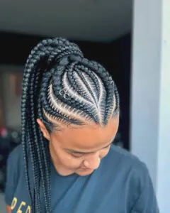 sleek high ponytail with goddess braids and silver hair ring accessories