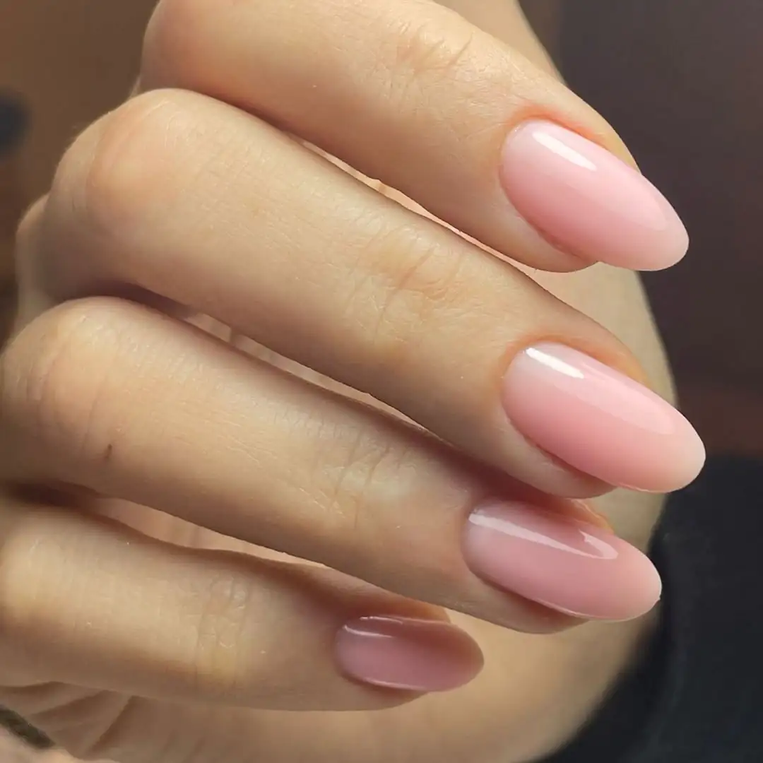 short oval nails with a soft sheer pink builder gel overlay