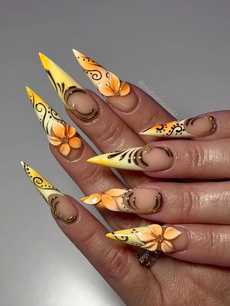 pointed stiletto manicure with 3d yellow flowers and gold swirls for august nails