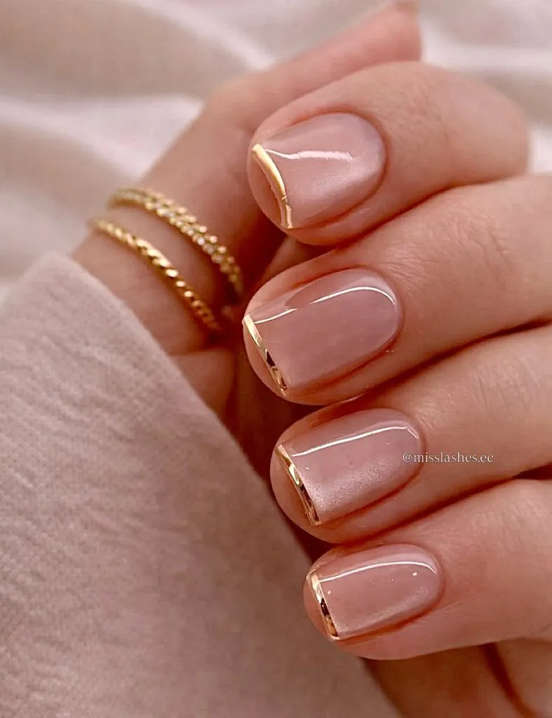 short square cat eye french tip nails with delicate golden edge detailing