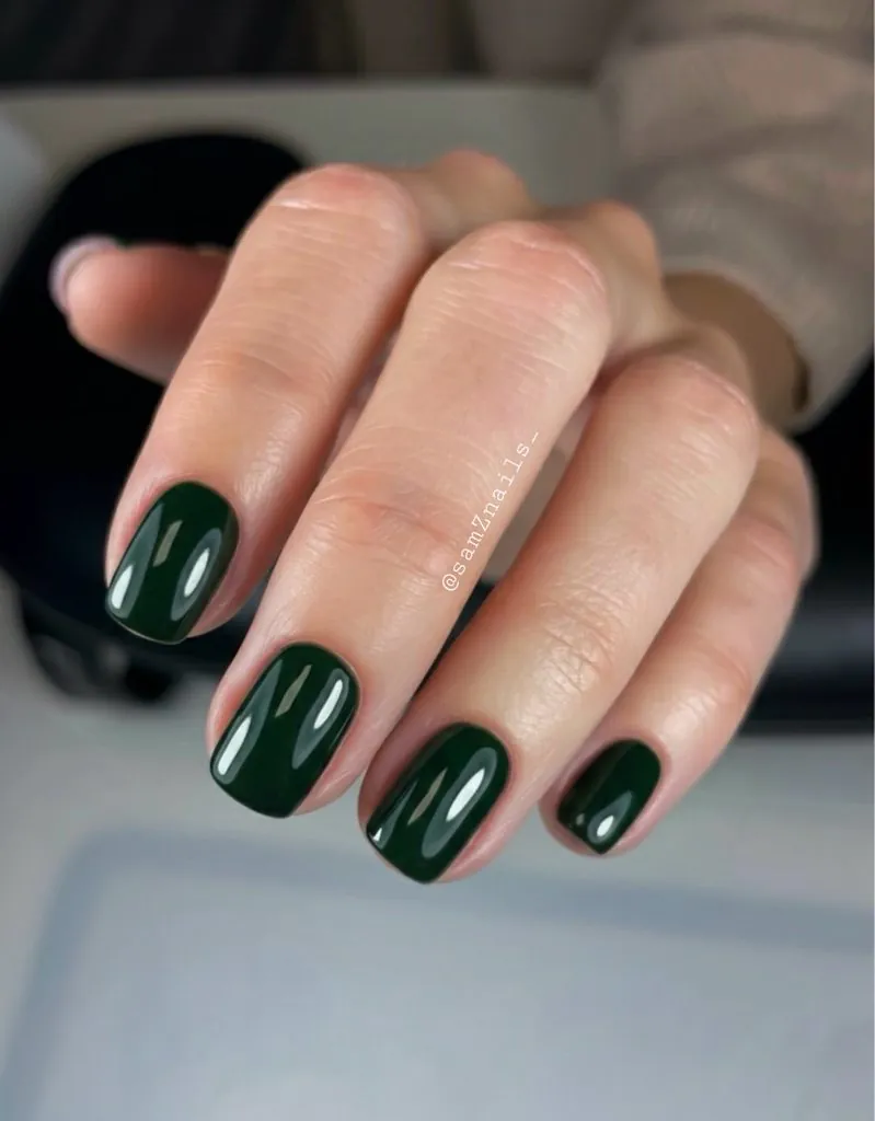 glossy dark forest green manicure on short square nails